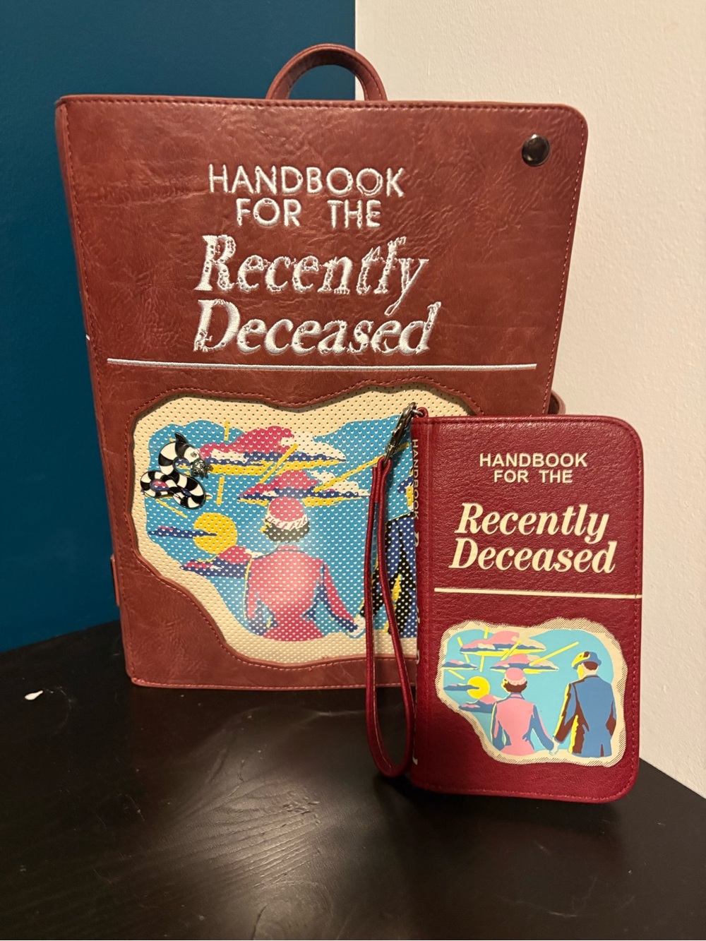 Red 'Handbook for the Recently Deceased' Faux Leather Backpack Wallet Set